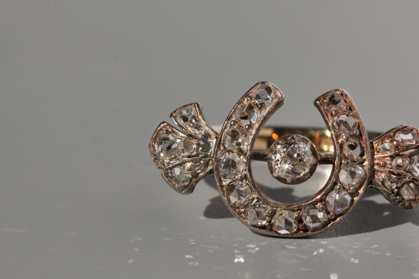 Antique old cut diamond horseshoe ring, in 9 carat gold