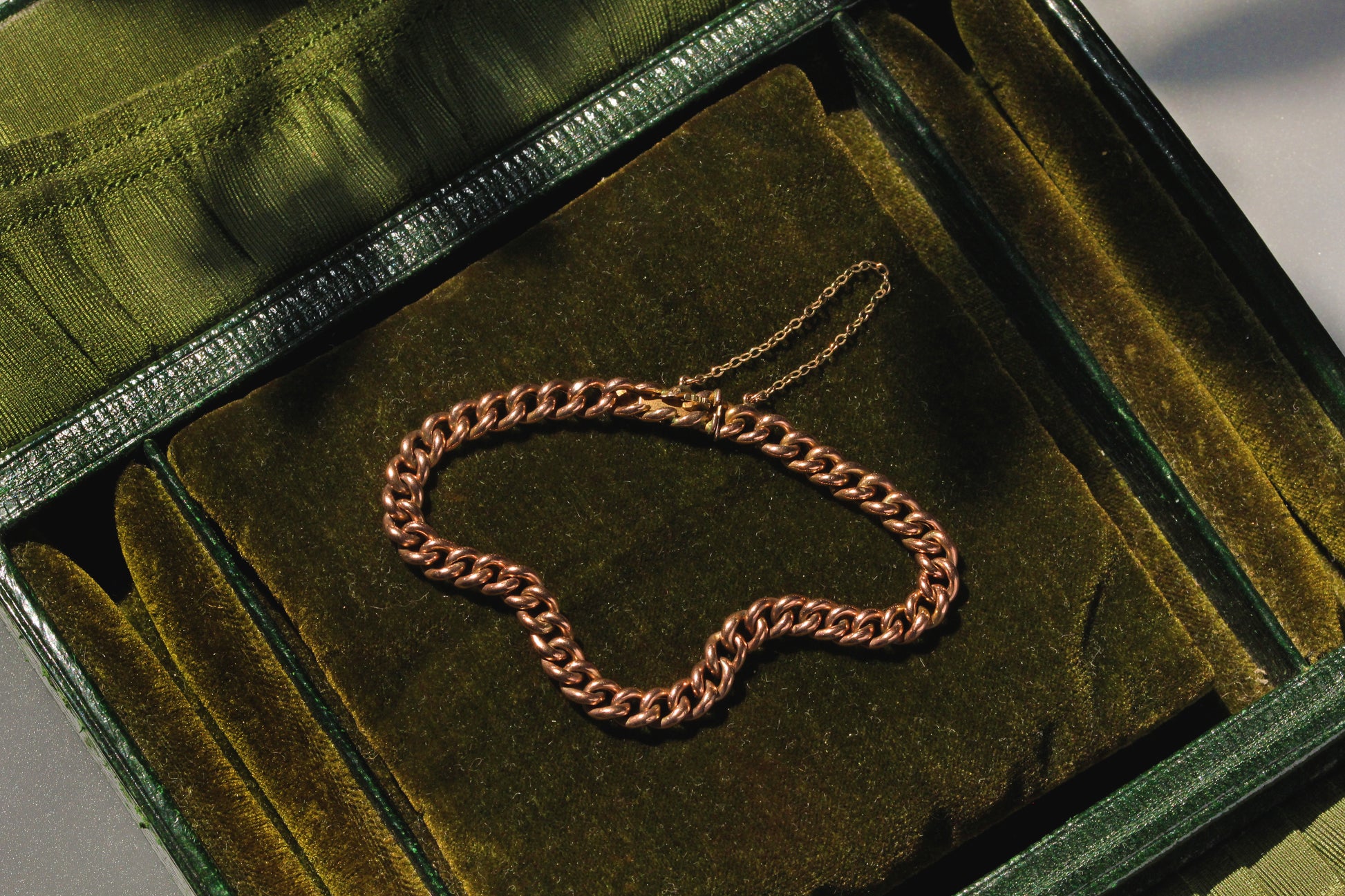 Antique 9 carat gold curb link bracelet with concealed patent bolt snap clasp
