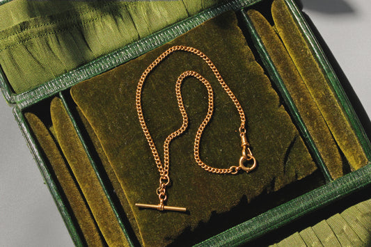 Antique curb link Albert chain in 18 carat gold

