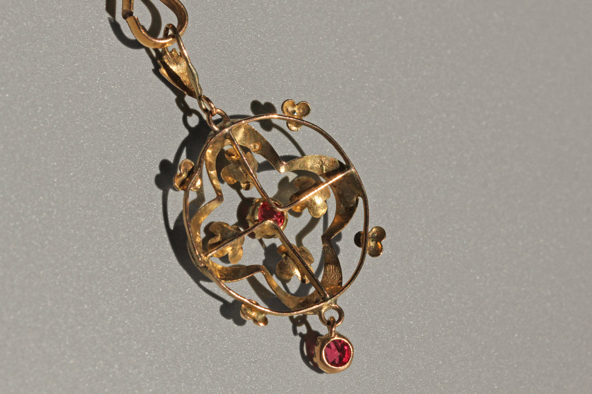 back view of Art Nouveau ruby paste pendant with hanging drop