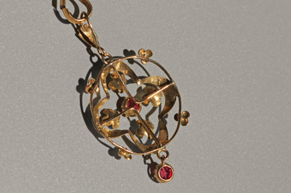 back view of Art Nouveau ruby paste pendant with hanging drop