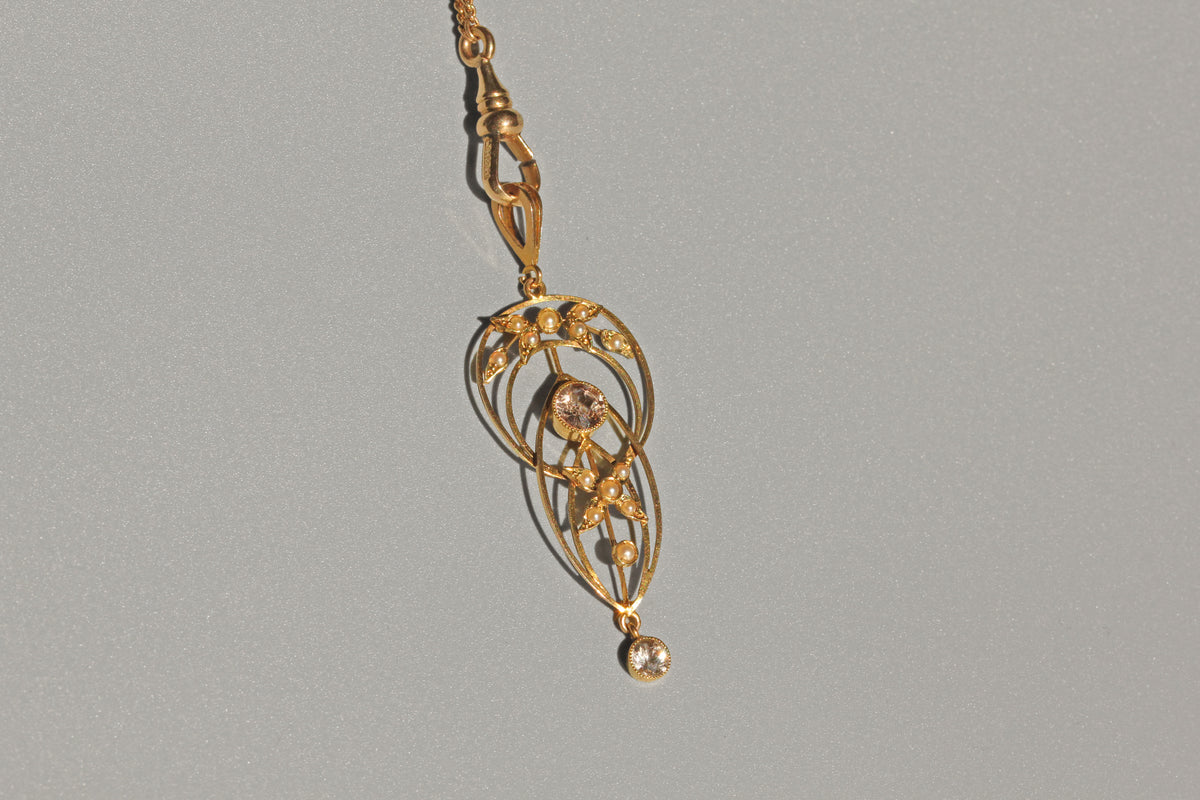 Antique Art Nouveau zircon and seed pearl lavaliere pendant in 9 carat gold on necklace
