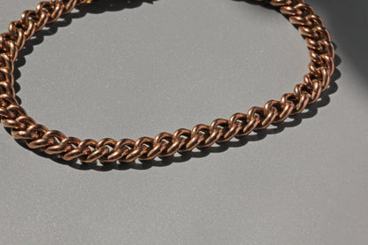 Antique 9ct gold bracelet with hidden clasp and traditional safety chain detail
