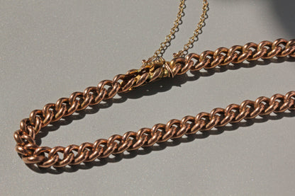 Victorian curb link bracelet with patent bolt snap fastening in antique gold
