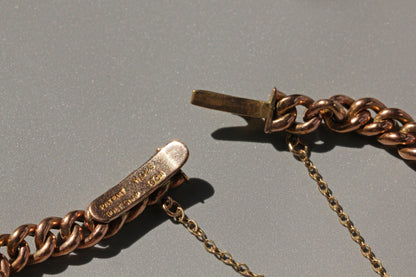 Elegant antique 9ct gold curb bracelet with seamless hidden clasp design