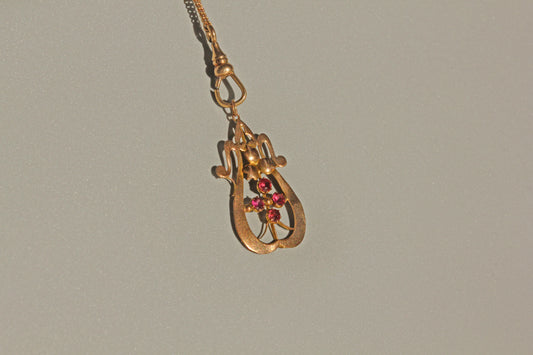 Antique Art Nouveau ruby pendant necklace in 9 carat gold
