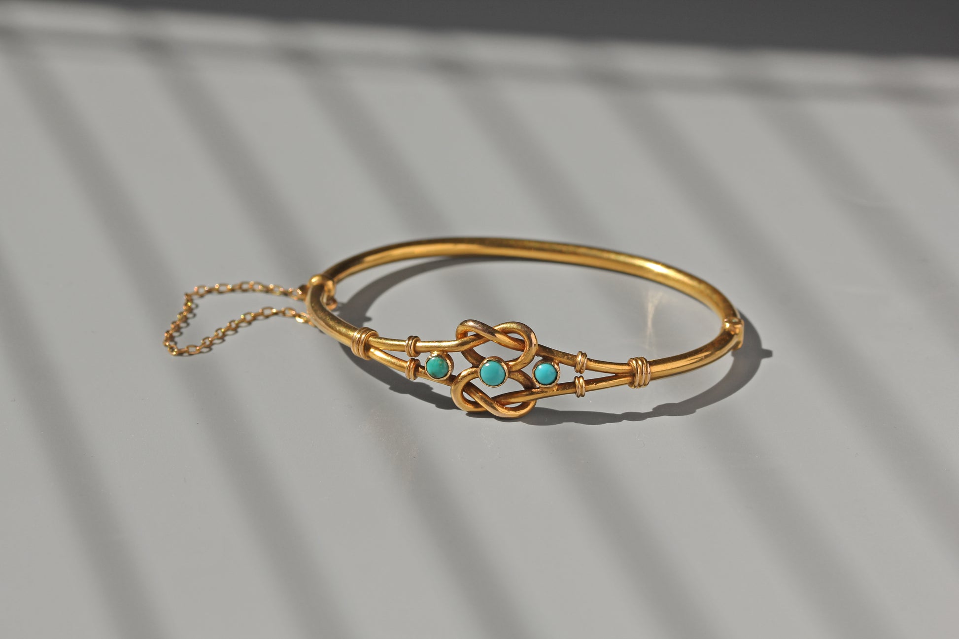 Victorian lovers knot turquoise bangle in 18ct gold
