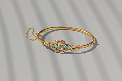Antique turquoise lovers knot bangle in 18 carat gold
