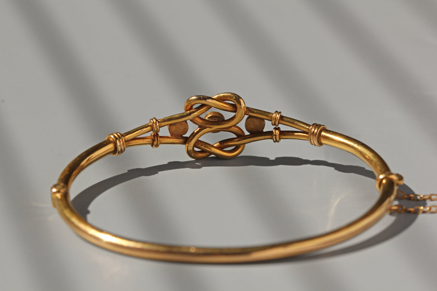 Antique turquoise lovers knot bangle, in 18 carat gold