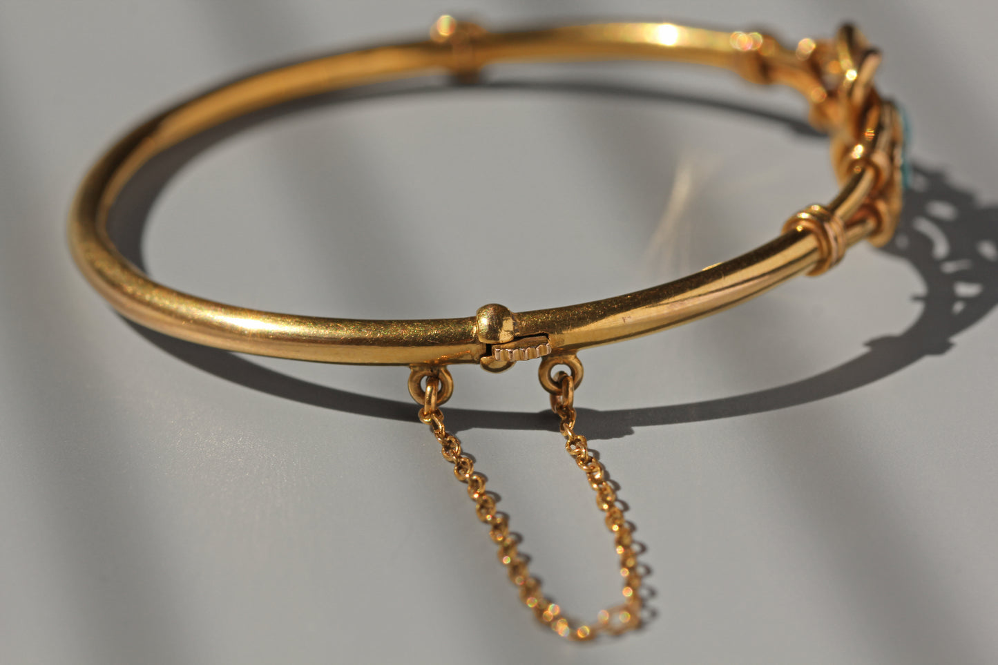Antique turquoise lovers knot bangle, in 18 carat gold