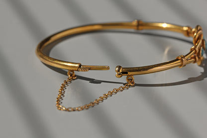 Antique turquoise lovers knot bangle, in 18 carat gold
