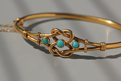 Antique turquoise lovers knot bangle, in 18 carat gold