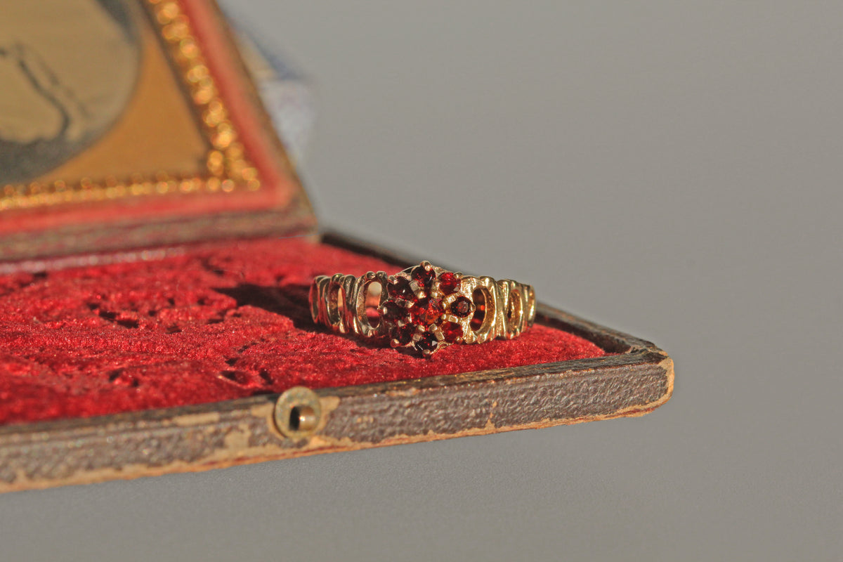 Vintage garnet flower cluster ring in 9 carat gold