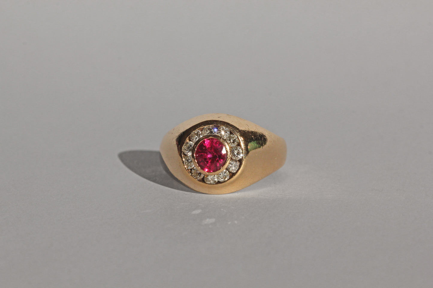 Vintage ruby and diamond bombe ring, in 14 carat gold