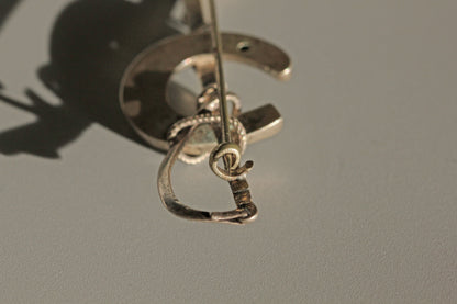 Antique lucky horseshoe riding crop brooch, in sterling silver