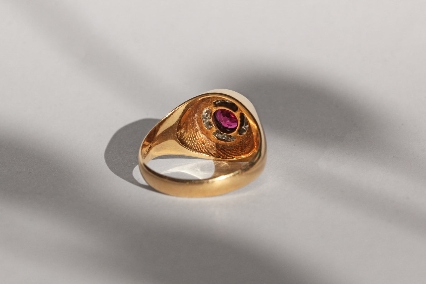 Vintage ruby and diamond bombe ring, in 14 carat gold