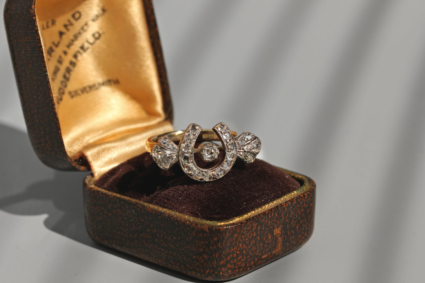 Victorian diamond horseshoe ring with rose cut and old mine cut diamonds
