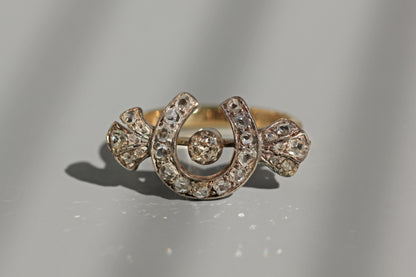 Close up antique rose cut diamond horseshoe ring
