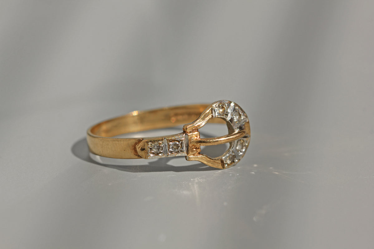 Vintage gold and diamond buckle ring hallmarked 1989
