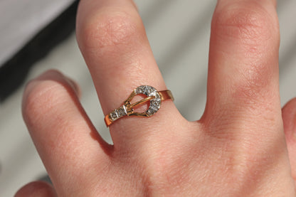 Vintage gold diamond belt buckle ring worn on hand
