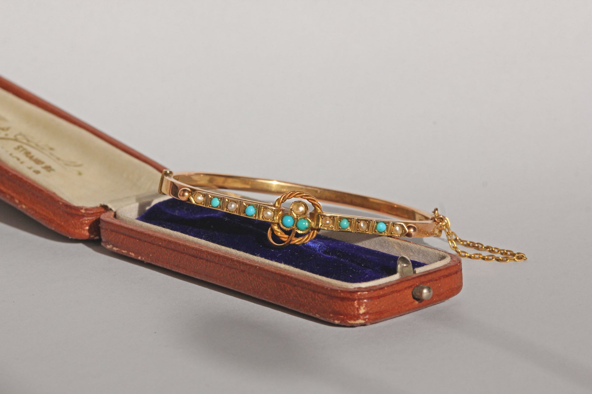 Antique turquoise and pearl ivy clover bangle in 9ct gold