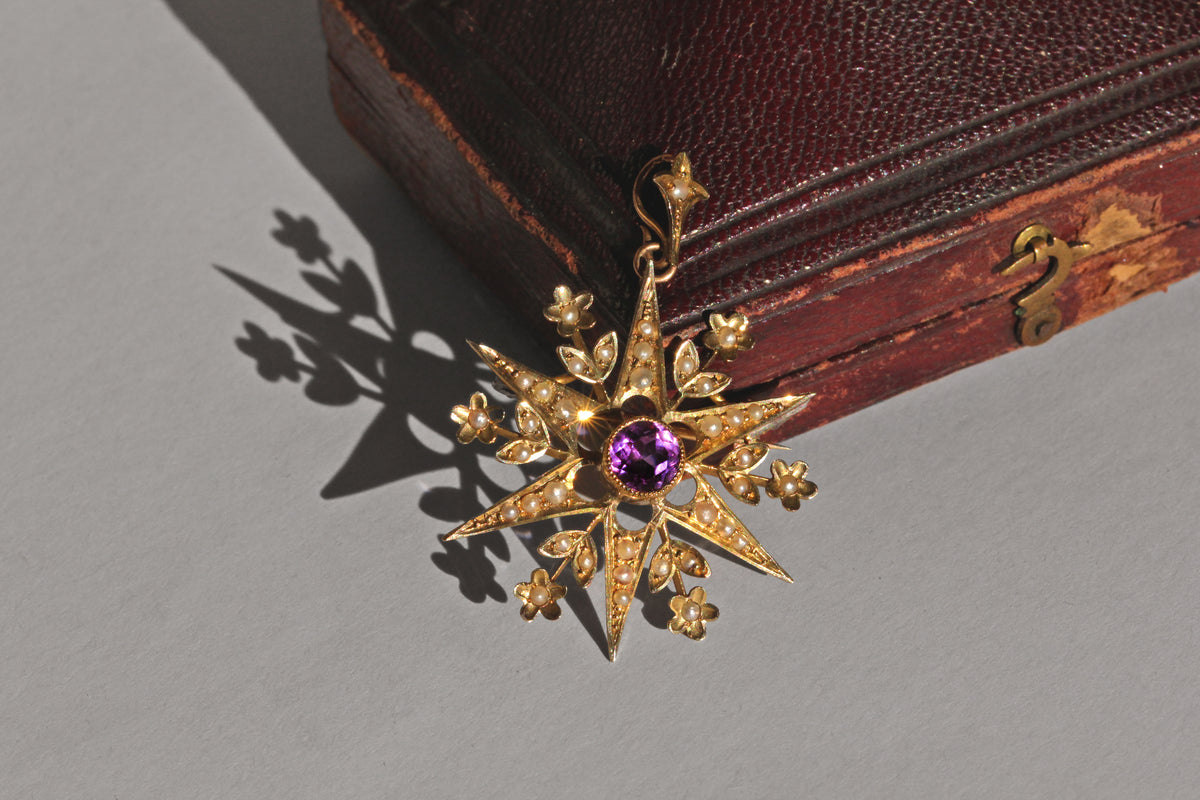 Antique Victorian amethyst and seed pearl star brooch pendant in 9 carat gold