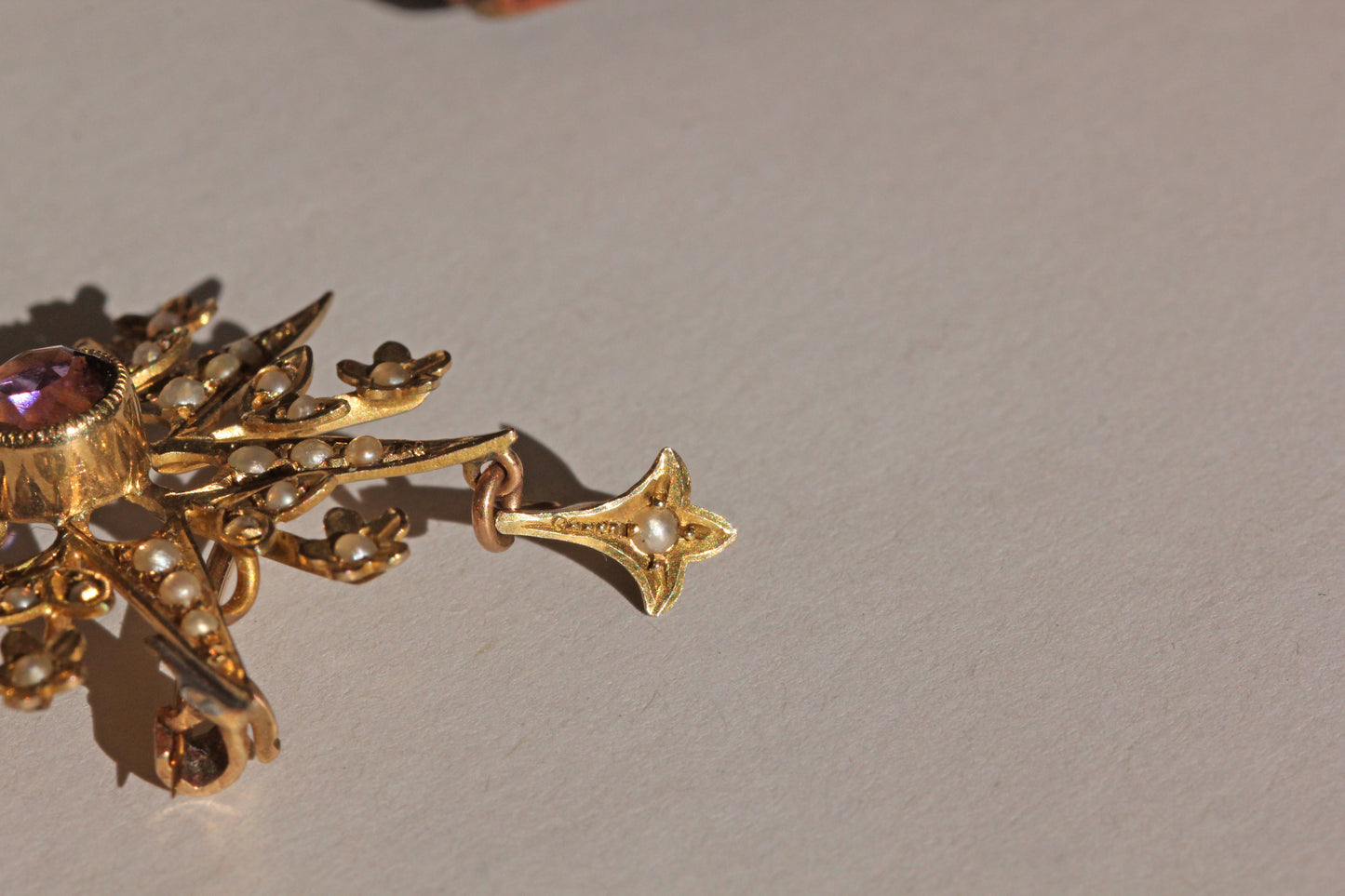 Antique victorian amethyst and seed pearl star brooch pendant, in 9 carat gold