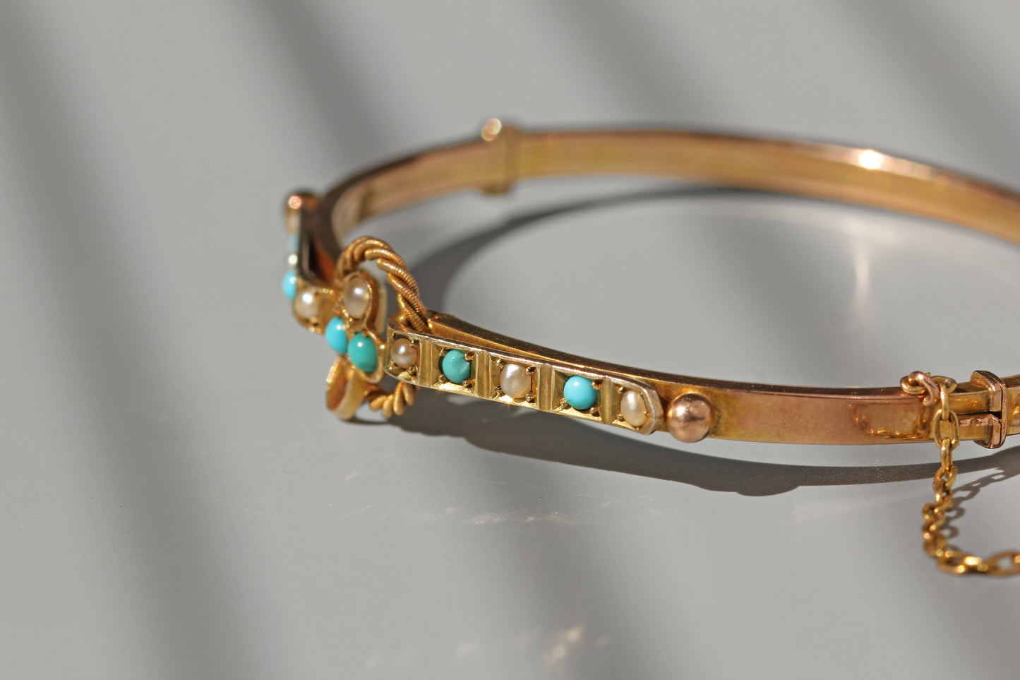 Antique turquoise and pearl ivy or clover bangle, in 9 carat gold