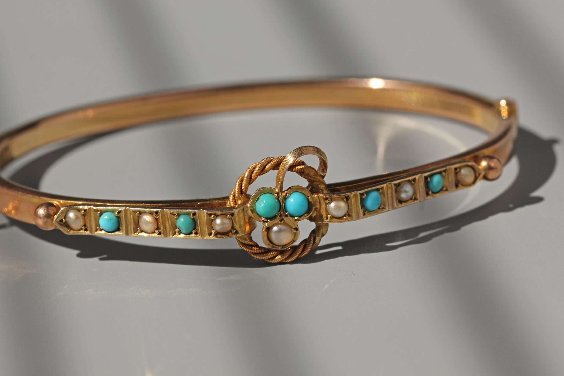 close up of 9 carat gold bangle with ivy leaf design