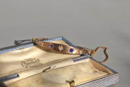 Antique victorian diamond and sapphire bangle, in 9 carat gold
