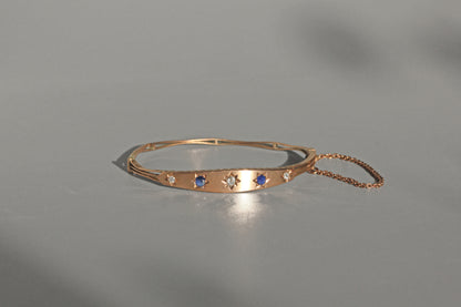 Antique victorian diamond and sapphire bangle, in 9 carat gold