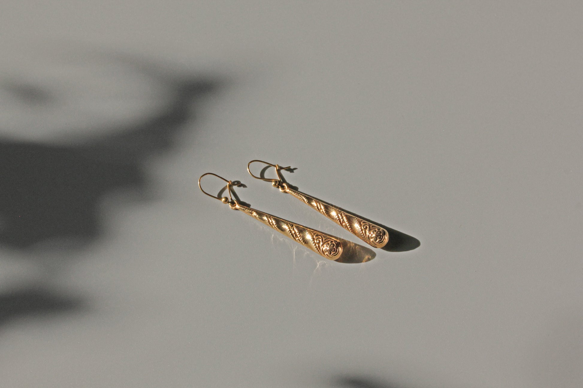 Long vintage torpedo earrings with beaded ear wires
