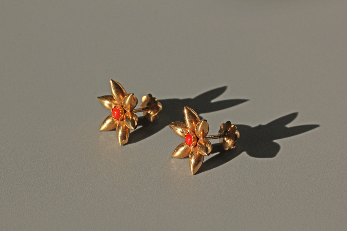 Victorian gold floral stud earrings with natural coral centres
