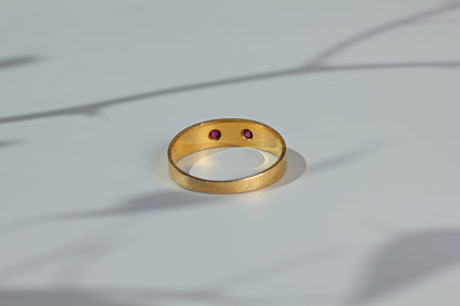 Antique ruby and pearl band ring, in 18 carat gold