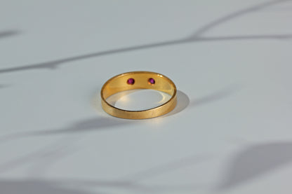 Antique ruby and pearl band ring, in 18 carat gold
