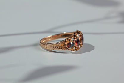 Antique garnet and pearl half hoop ring, in 9 carat gold