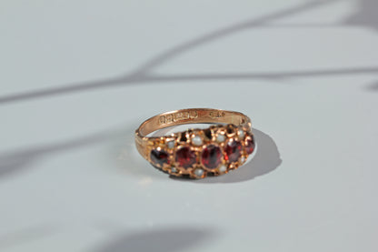 Antique garnet and pearl half hoop ring, in 9 carat gold