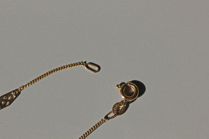 Vintage dainty fine curb link station chain, in 9 carat gold