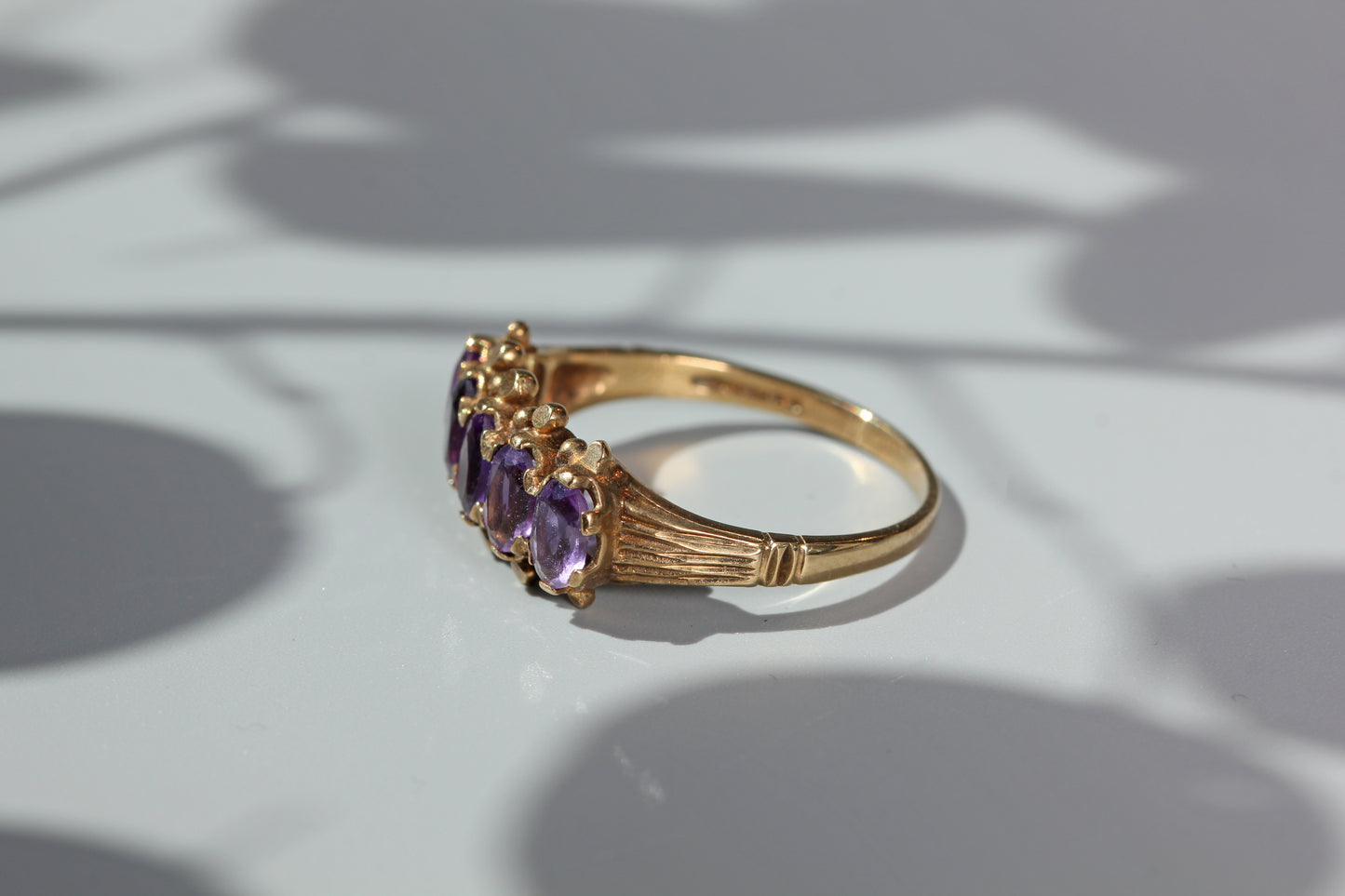 Vintage amethyst five stone ring, in 9 carat gold