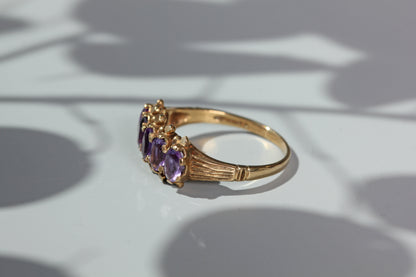 Vintage amethyst five stone ring, in 9 carat gold