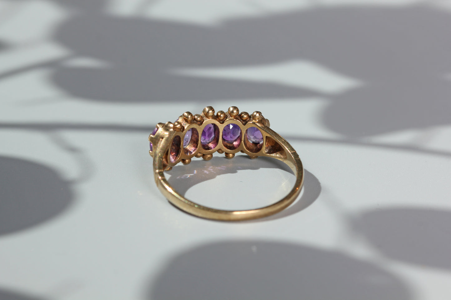 Vintage amethyst five stone ring, in 9 carat gold