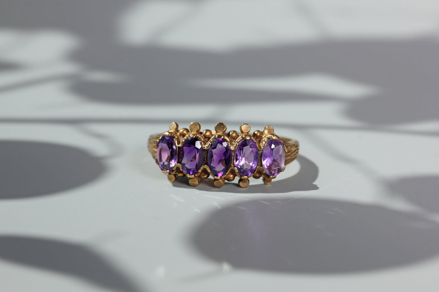 unique vintage gold ring with amethysts