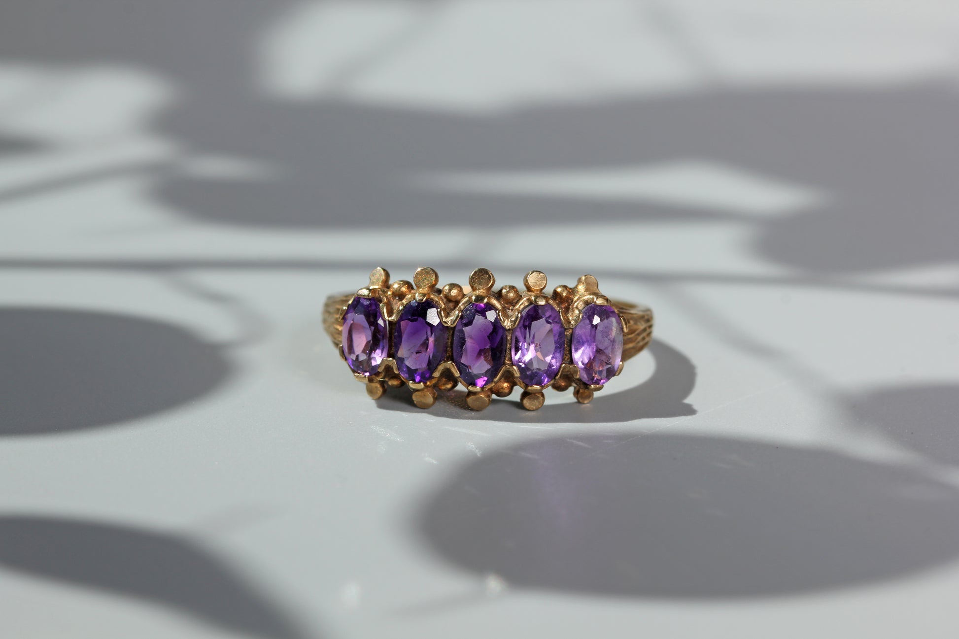 unique vintage gold ring with amethysts