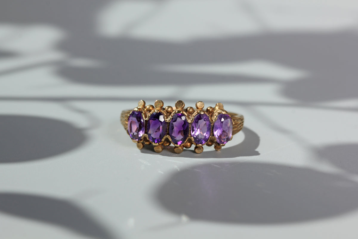 unique vintage gold ring with amethysts