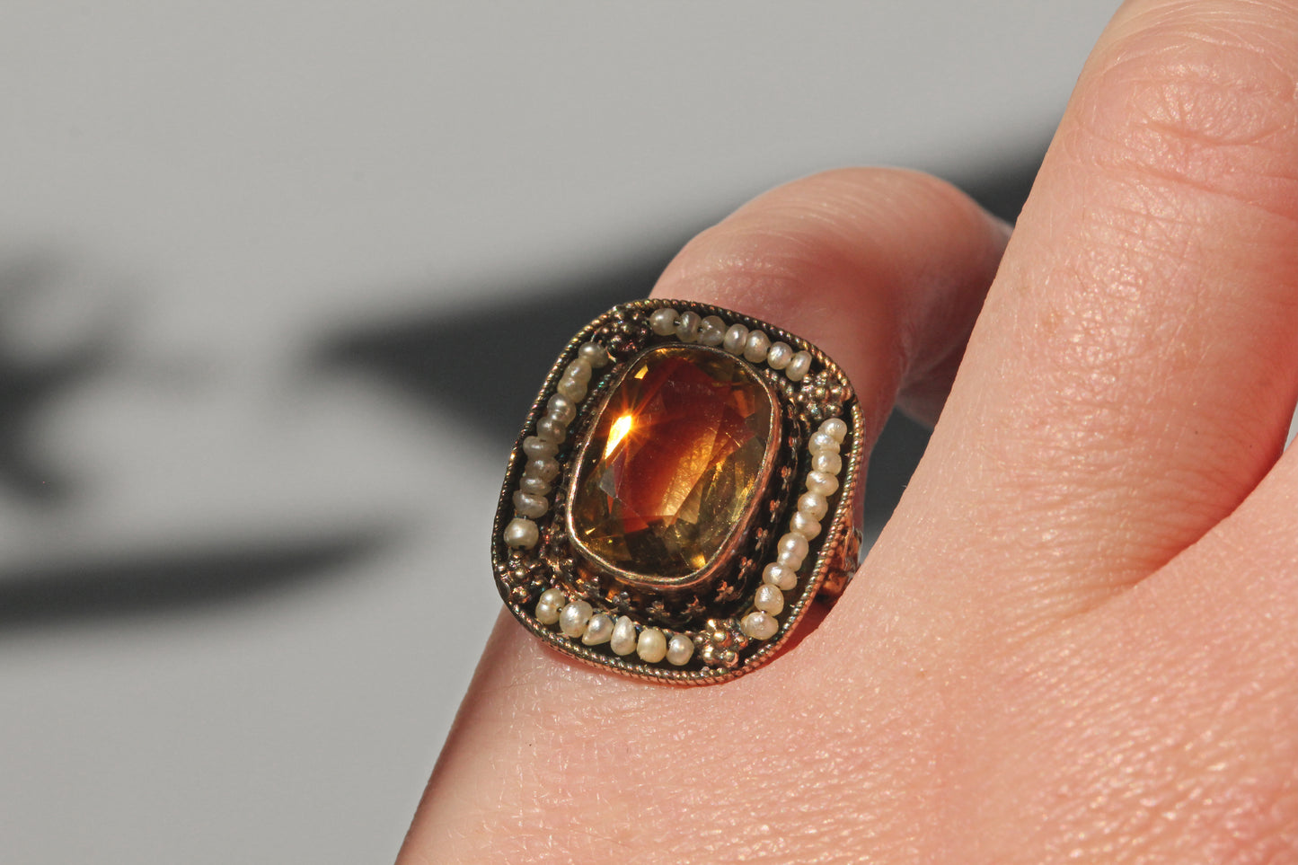 Antique georgian citrine and seed pearl ring, in 9 carat gold