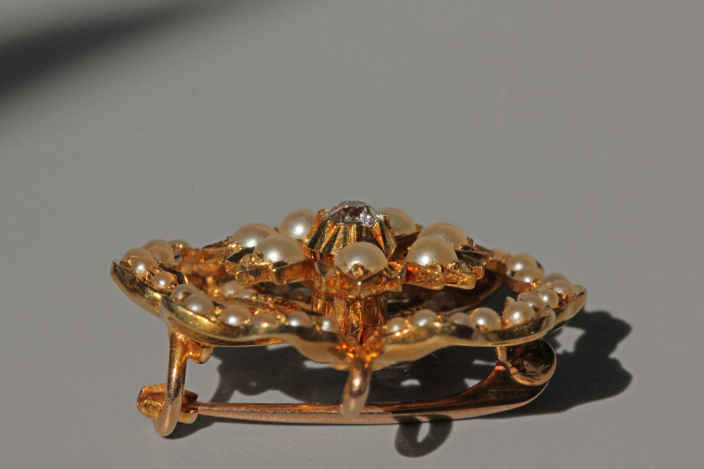 Antique victorian old cut diamond and pearl brooch pendant, in 15 carat gold