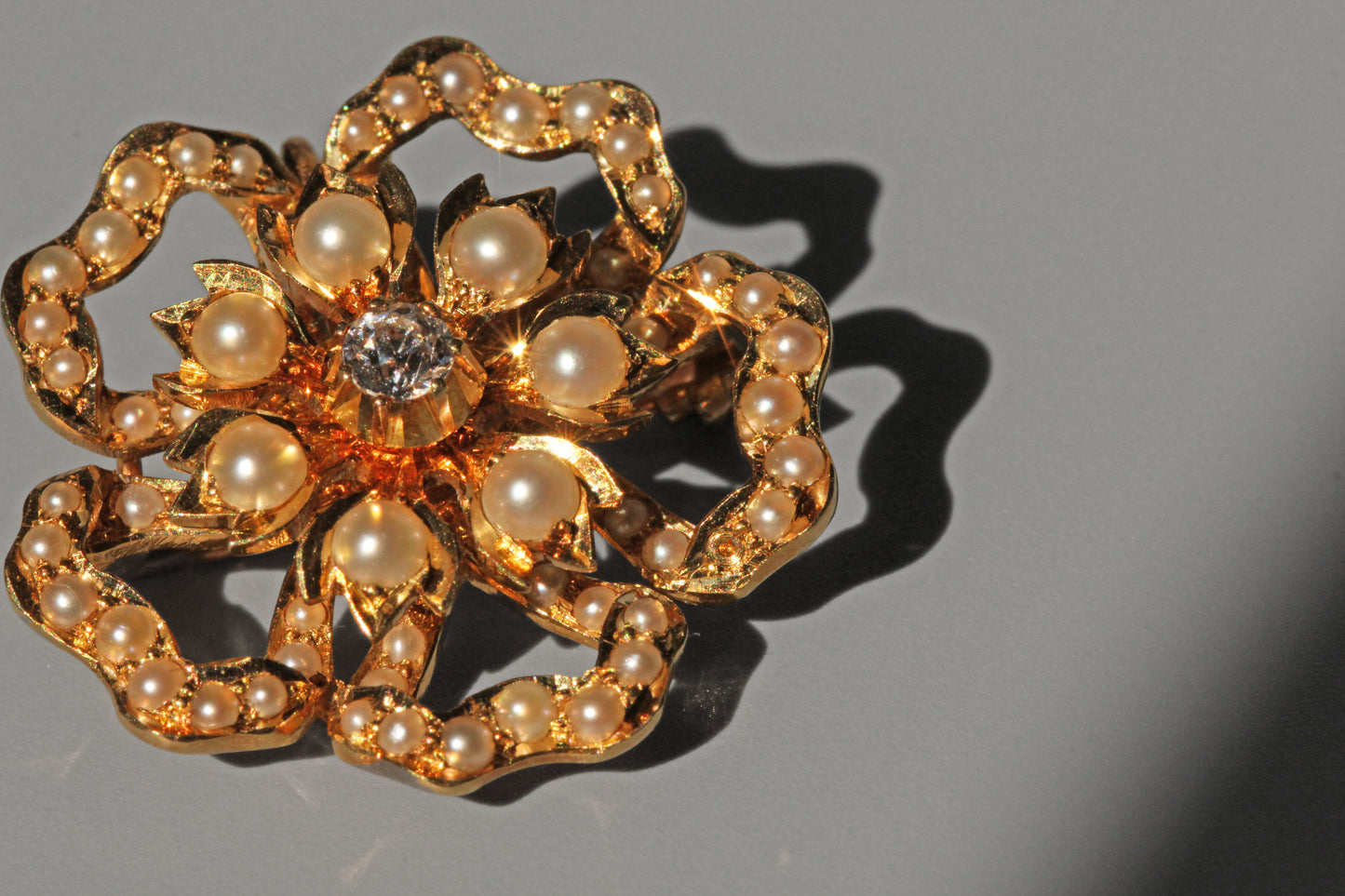 Antique victorian old cut diamond and pearl brooch pendant, in 15 carat gold