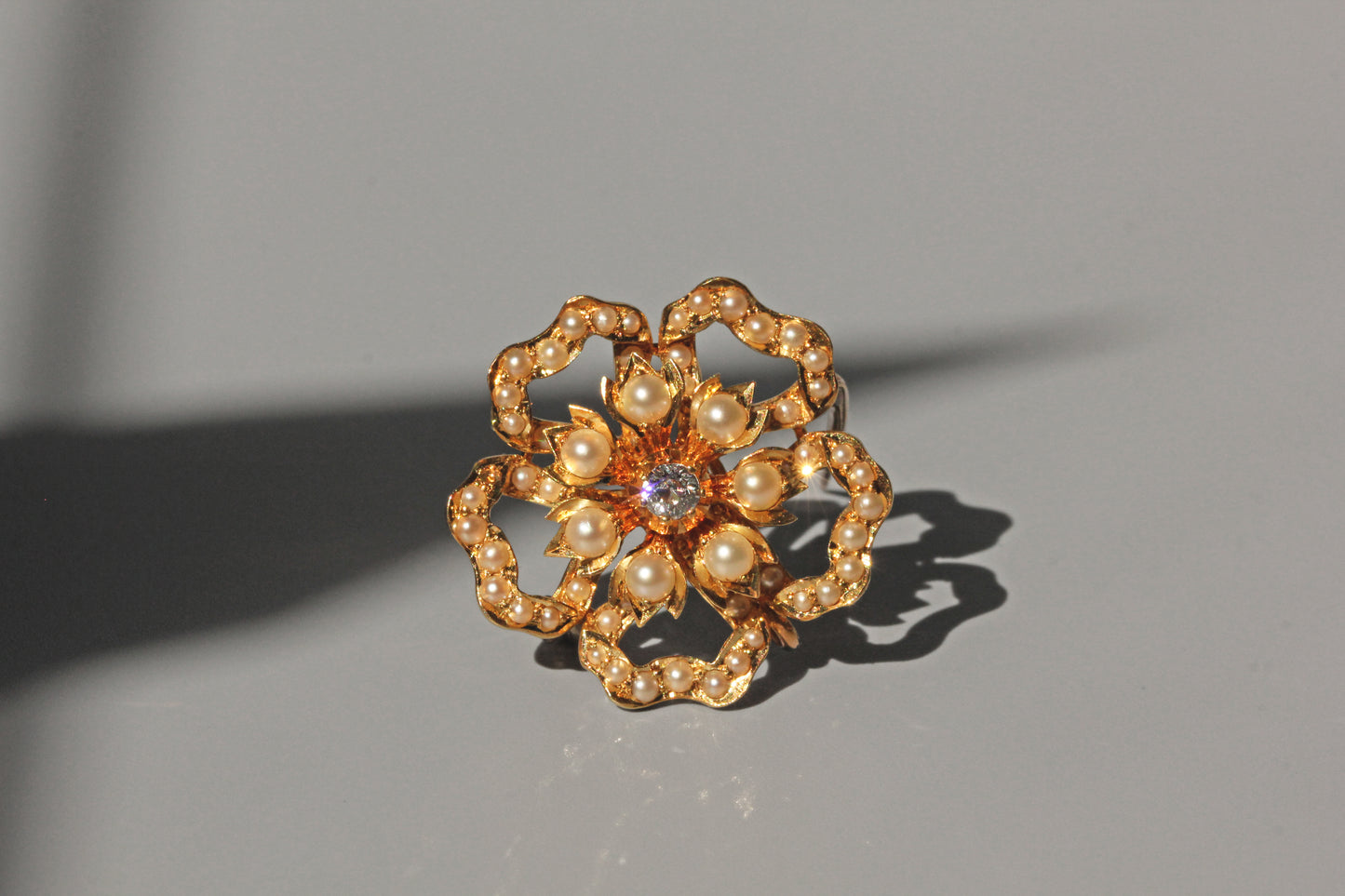 Antique victorian old cut diamond and pearl brooch pendant, in 15 carat gold