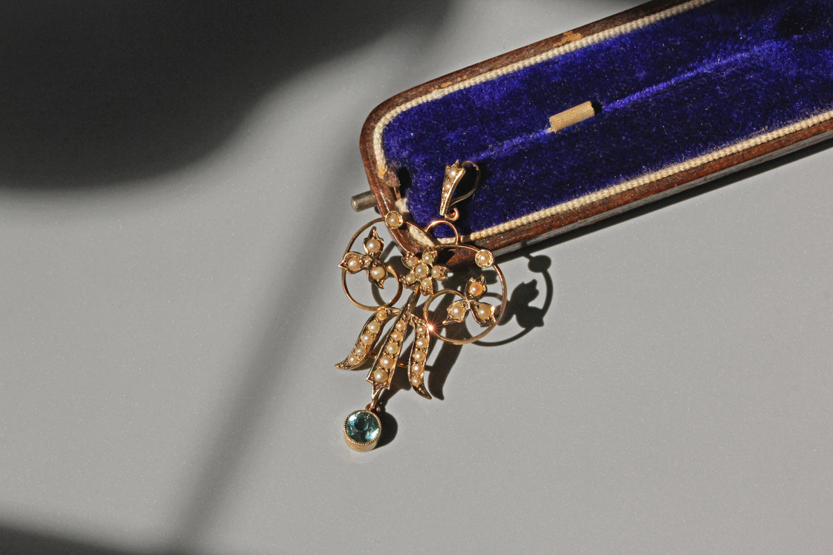 Antique Victorian seed pearl and aquamarine pendant in 9 carat gold