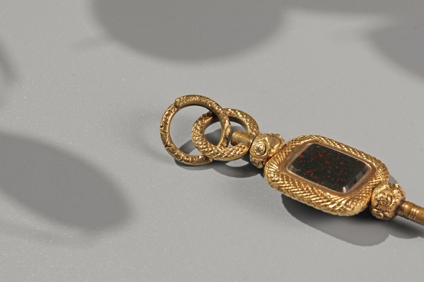 Antique bloodstone watch key with split ring, in 9 carat gold